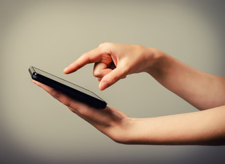 Tablet PC in the hands of a girl