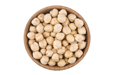 Chick peas in wooden bowl isolated on white