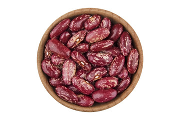 Multicolored kidney beans in wooden bowl isolated on white