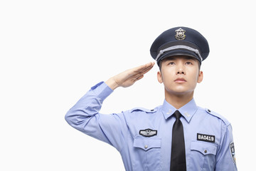 Police Officer Saluting, Studio Shot 