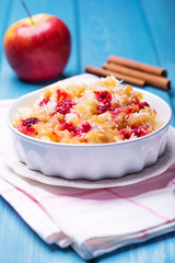 Rice pudding with applem raspberry and cinnamon - obrazy, fototapety, plakaty