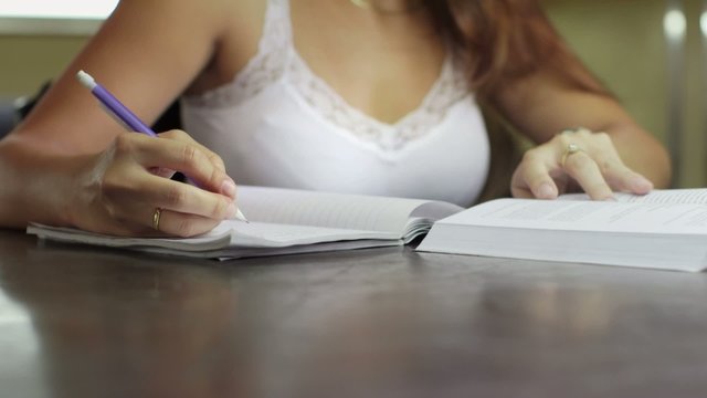 Young caucasian woman studying in high school, students