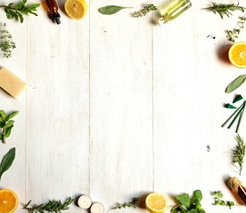 Fruits,herbs and aromatherapy.on white wood background - obrazy, fototapety, plakaty
