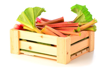 Fresh rhubarb in wooden crate