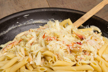 Dungeness Crab macaroni and cheese on the stove