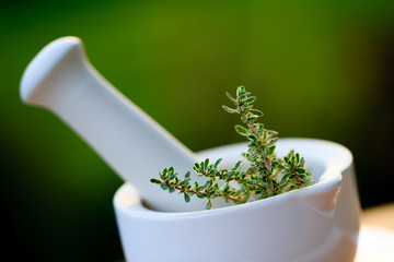 Fresh herbs in the mortar - healthy food