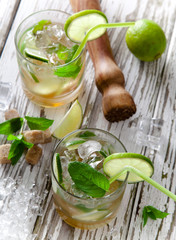 Summer drinks on vintage wooden background
