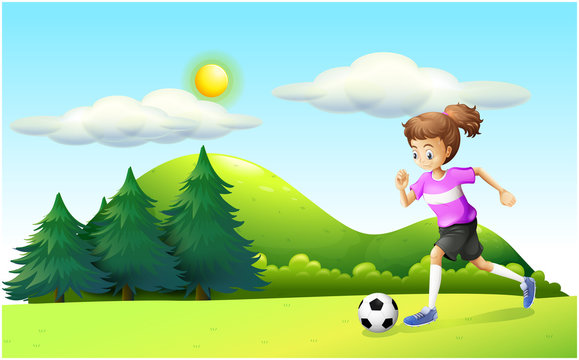 A girl playing soccer
