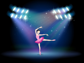 A woman dancing ballet with spotlights
