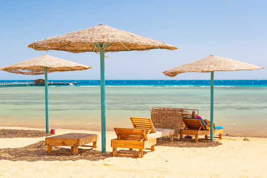 Relax under parasol on the beach of Red Sea, Egypt