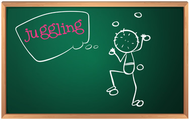 A blackboard with a boy juggling