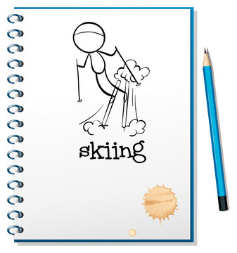 A notebook with a drawing of a boy skiing