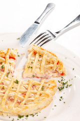 tasty quiche with cheese and herbs