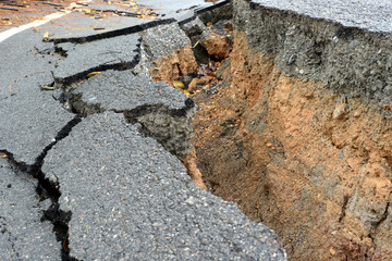 broken asphalt road