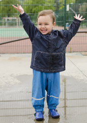 Child in puddle