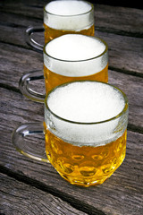 beer on wood background
