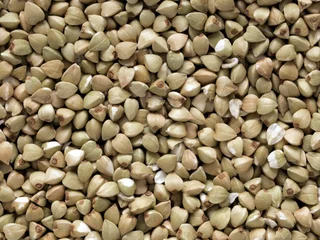 Foto op Plexiglas buckwheat grains © fkruger
