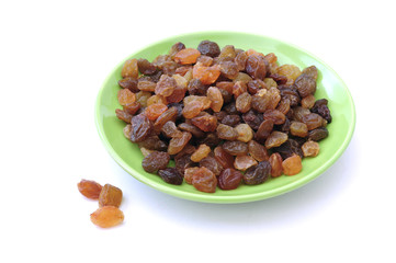 raisins on a plate isolated