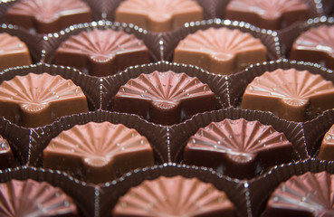 Chocolate candies in box selective focus