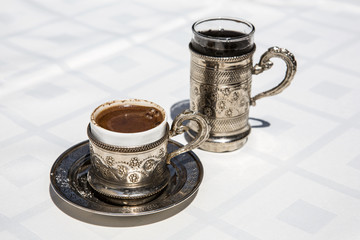 Cup of Turkish Coffe with water