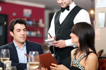 Couple having dinner in a luxury restaurant