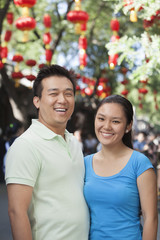 Fototapeta premium Portrait Of Smiling Couple In Nanluoguxiang, Beijing