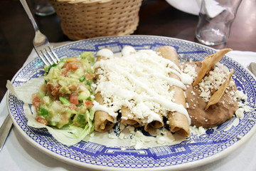 Enchiladas with cheese and beans
