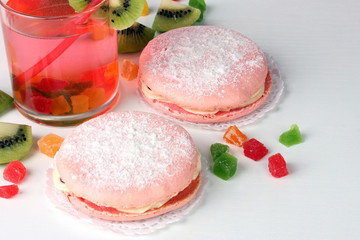 Two cakes and cocktail isolated on white