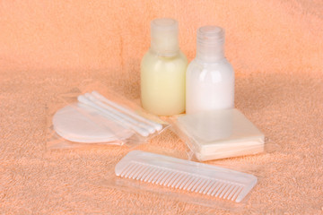 Hotel amenities kit on towel