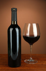 Composition of wine bottle and  glass of red wine,