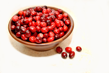 A Wooden Bowl Full of Cranberries