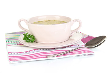 Nourishing soup with vegetables in pan isolated on white