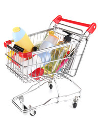 Cosmetics in cart isolated on white