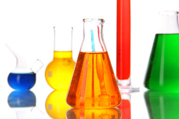 Test tubes with colorful liquids isolated on white