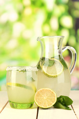 Citrus lemonade in pitcher and glass