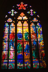 Stained glass windows of St. Vitus in Prague, Czech Republic.