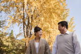 Mature Couple Walking in the Park