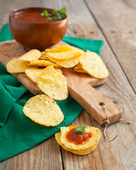 Tortilla chips served with a salsa sauce