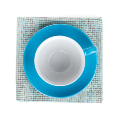Coffee cup over kitchen towel