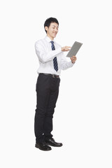 Businessman using digital tablet