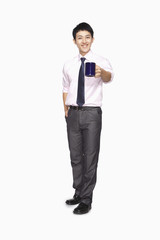 Businessman smiling with mug