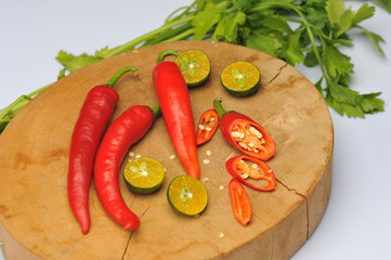 Raw vegetables on chopping board