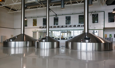 Steel fermentation vats on brewer factory
