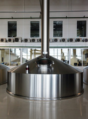 Steel fermentation vats on brewer factory