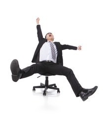 Successful excited Business man sitting in chair