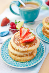 Pancakes with fresh berries for breakfast 