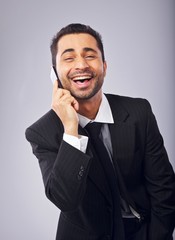 Cheerful Professional with Phone Laughing
