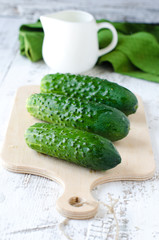 Fresh cucumbers on the cutting Board