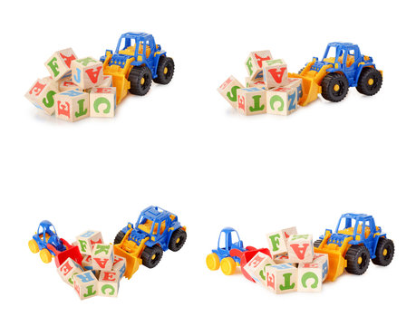 Wooden alphabet blocks with a toy tractor