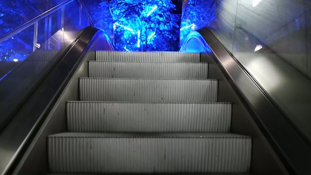 escalator - upstairs to the blue